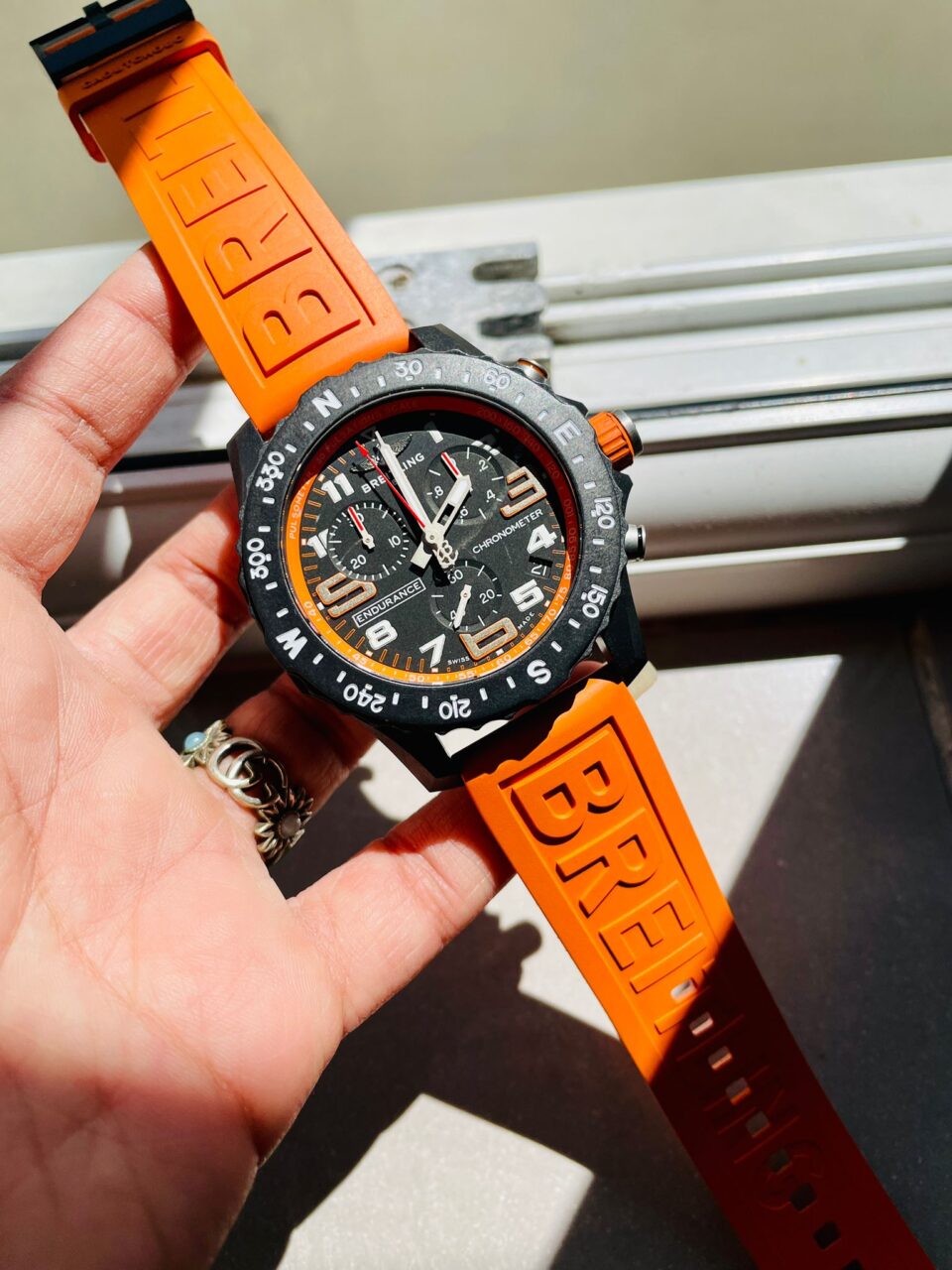 OGF Factory 1:1 Breitling Endurance pro 44mm Black dial orange Rubber Strap quartz movement